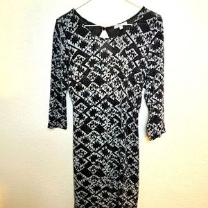 Calf length shiny open back dress